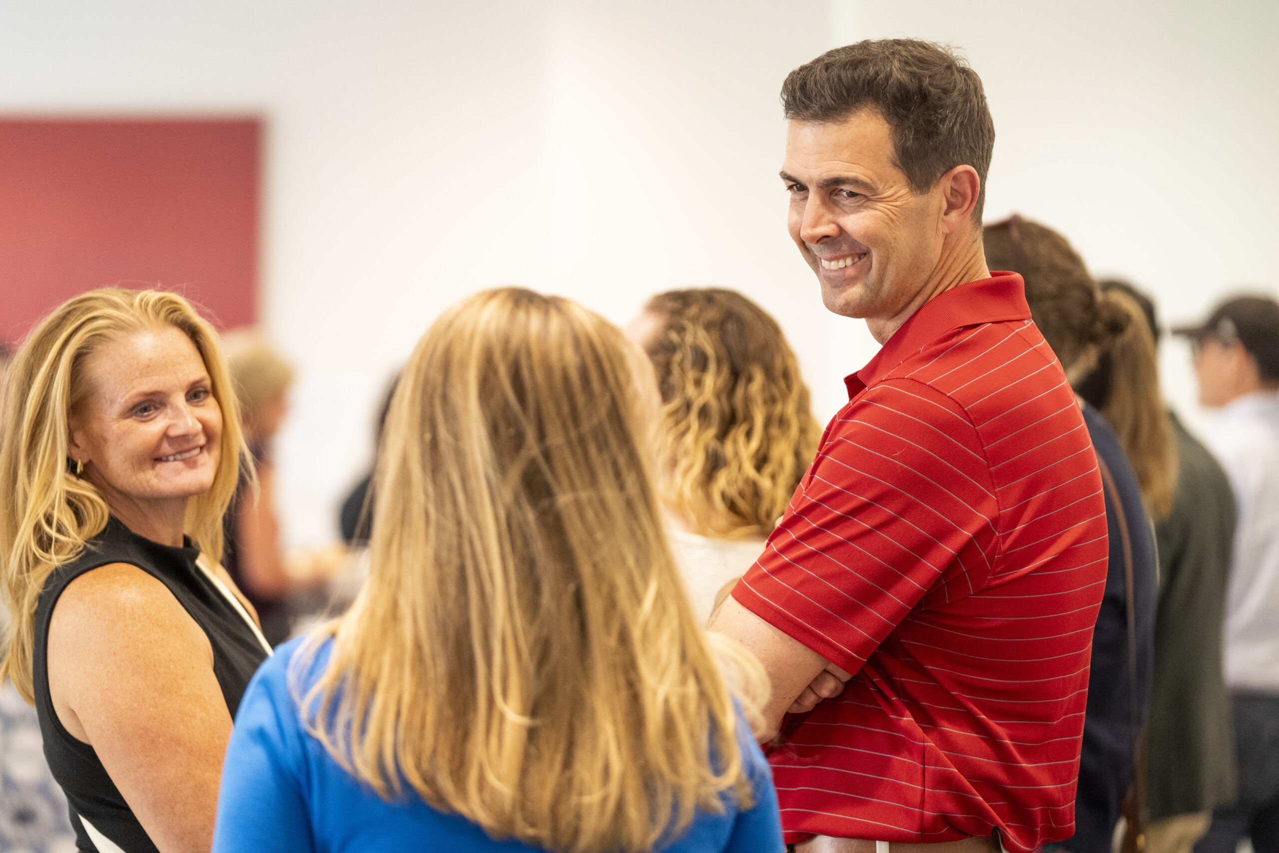 Faculty chatting at Faculty Soiree